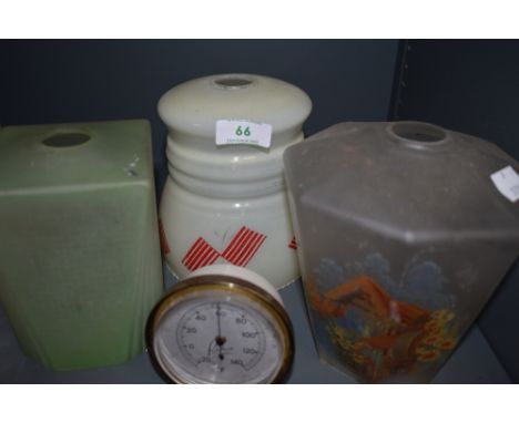 Three vintage deco styled glass lamp shades and a Rototherm thermometer.