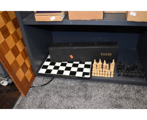 A selection of chess items and games including wooden veneered board