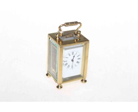 Miniature brass carriage clock