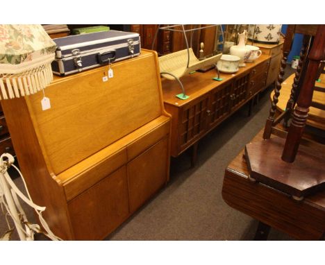 Teak bureau, teak long john sideboard, teak extending dining table and wrought iron telescopic standard lamp and shade (4)