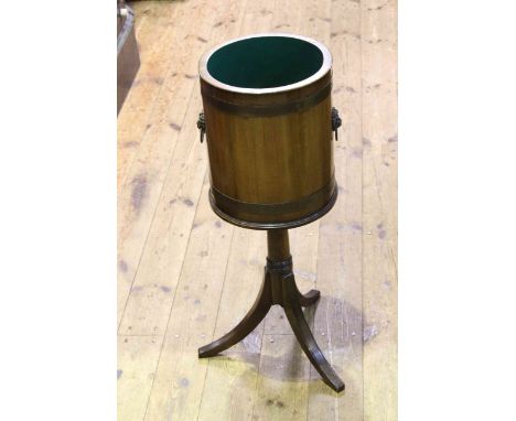 Circular brass bound planter on tripod base, 71.5cm