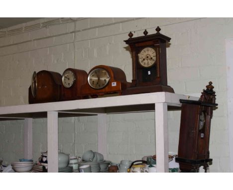 Small wall clock and four mantel clocks