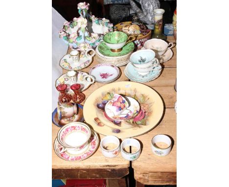 Floral encrusted basket and pair of chamber sticks, various cups and saucers, Aynsley plate, three Herend napkin rings, etc