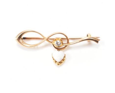 A 9ct gold, opal and diamond bar brooch. The cross over bar brooch set with a round brilliant cut diamond to centre having a 