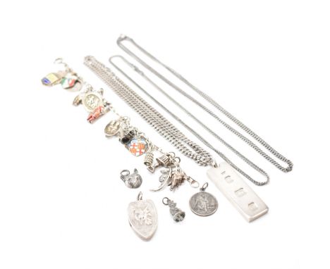 A group of vintage silver jewellery items. The lot to include; two white metal chains, charm bracelet with multiple charms, f