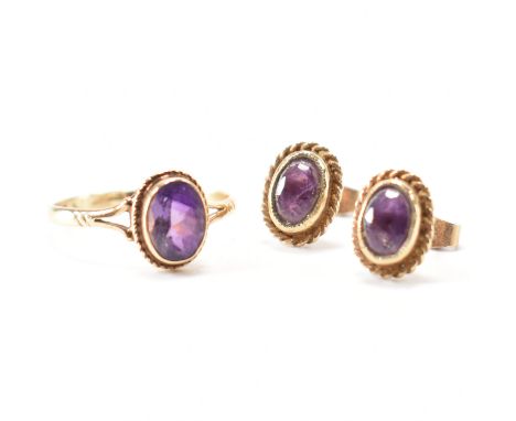 A hallmarked 9ct yellow gold &amp; purple stone demi parure. Having a matching set of stud earrings &amp; a ring all with ova