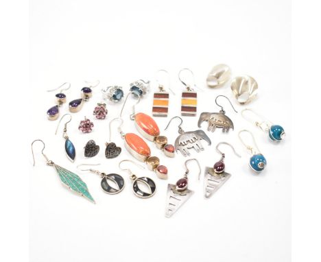 An assortment of vintage silver pairs of earrings to include handmade silver elephant earrings, several pairs of stone set st