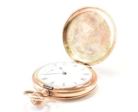 A Dennison moon gold plated full hunter pocket watch. The pocket watch having a enamel face with roman numeral chapter ring w