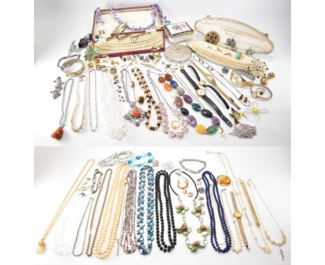 A collection of vintage costume jewellery. The lot to include a selection of vintage brooches, beaded necklaces, simulated pe