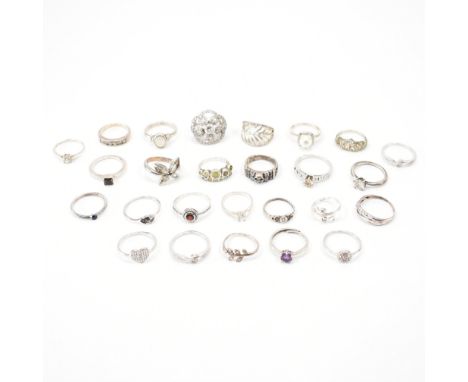 Group of 925 silver stone set rings. The lot to include; white stones, leaf design, flower design, purple stone, solitaire ri