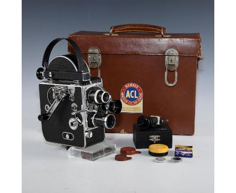 Case, adapters, rare Cadro prismatic focuser in box w. papers.Revered as the camera that started a thousand careers, the Pail