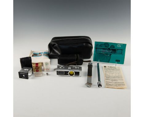 Camera in case, micro tripod, film cans, original manual.Up for auction is this Rollei 16, a 16mm subminiature camera made du