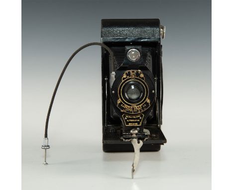 Black leatherette and metal with chrome extension arms.Exemplary Art Deco camera in good mechanical condition with operable v