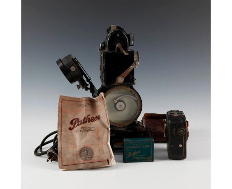 Includes original manual and 2 spare bulbs; early and unusual.In the early days of film, no format was sacred- 70mm, today an