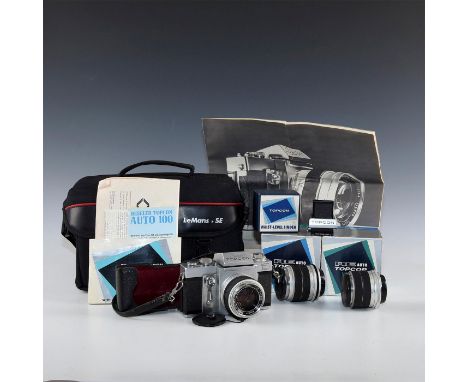 35mm SLR with half case, 3 lenses, accessory finder, bag, extended literature.ï¿½Beseler Topcon Super D was the combat camera