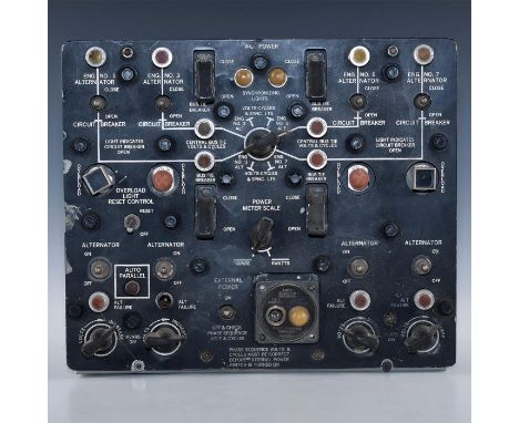 Engineered with a profusion of moving dials and switches, and various removable boards.An aviation control panel with indicat