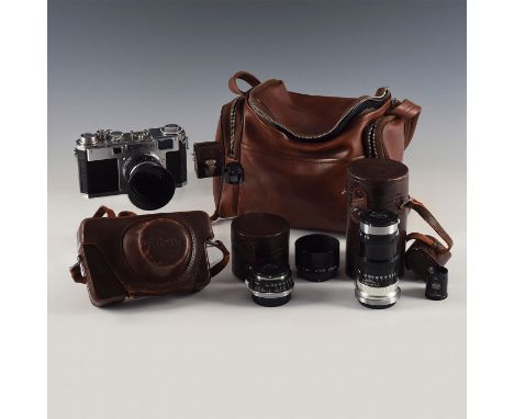 Legendary camera with 35, 50, 135mm lens, accessory viewfinders.Introduced in 1955 and in direct competition to the successfu