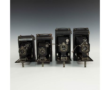 Black leatherette exterior with chrome and other pieces.Grouped for decorative appeal, four Kodak Model 1A Autographic Junior