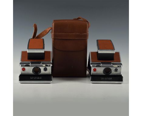 Two models, both open fully- one with original leather case.A handsome pair for display or use, the SX-70 is one of the quint