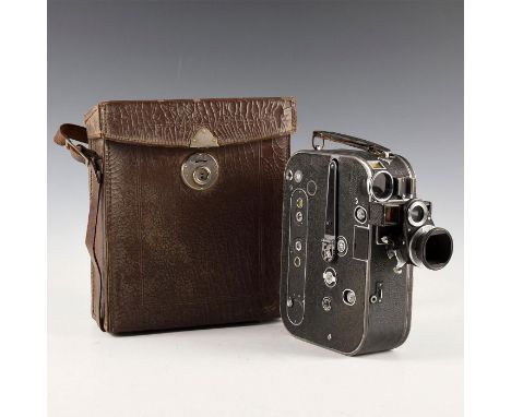 Clockwork movie camera with lens, original case.Art Deco era artifact produced during the golden age of cameras. Zeiss Ikon c