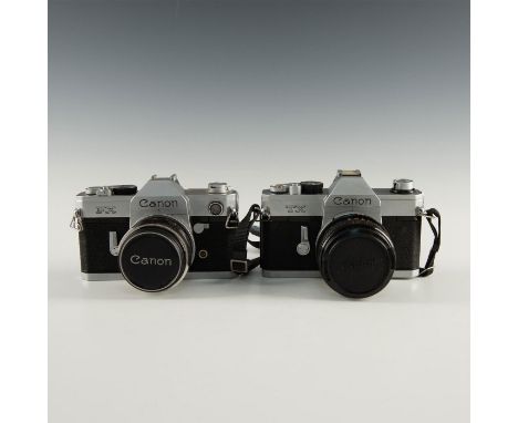 Both camera lens type are 35mm SLR.Both camera's have a built in electric light meters. Canon FX shutter is horizontally-trav