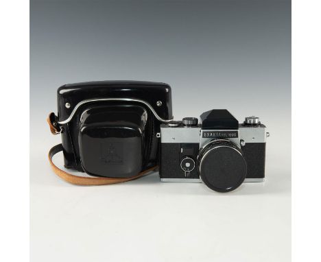Working condition with clean 1.8 F50mm Meyer Gorlitz lens.Solid German SLR camera with working shutter, timer, dual shutter r