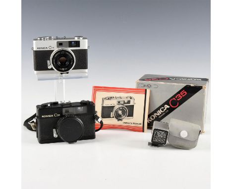 Includes one original box, manual, and flash, unit in case.Silver model from (1968) and black from(1969). Equipped with 38mm 