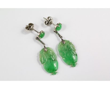 A Pair of Lady's Carved Jade Earrings, the drop measures approx 20 x 12mm, approx 5.7 gms.