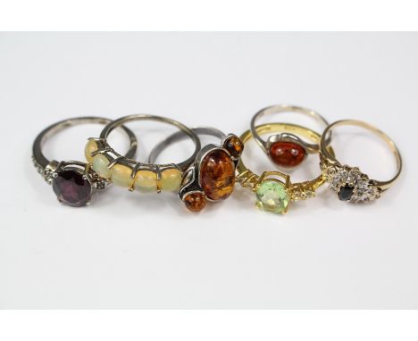 Collection of Silver Rings, including garnet, amber, peridot,&nbsp; together with a 9ct gold sapphire ring. (6)