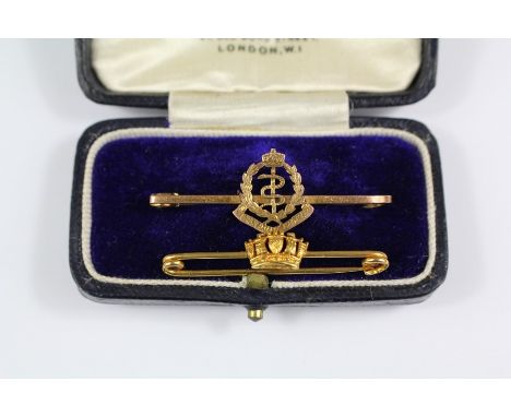 A 9ct Gold Royal Medical Corps Stick Pin, complete with the Gieves &amp; Hawkes presentation box, approx 2.2 gms together wit