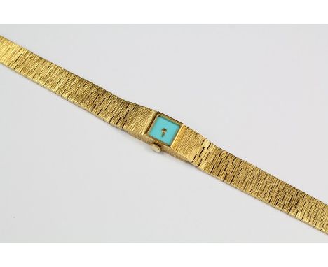 A Lady's 9ct Yellow Gold Milner Wrist Watch, turquoise face with 17 jewel movement stamped RMK, dated 1968, approx 30 gms, (w