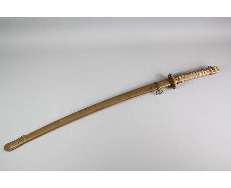 An Early 20th Century NCO Shin-Gunto Sword. The sword features a single fullered blade approx 70 cms length, assembly nr 1389