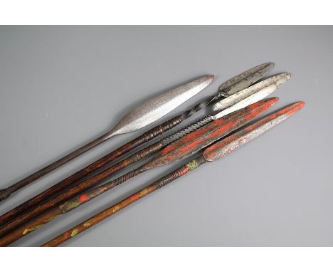 Five Antique African Throwing Spears, with various barbed spear heads. The first approx 150 cms in length, the blade approx 2