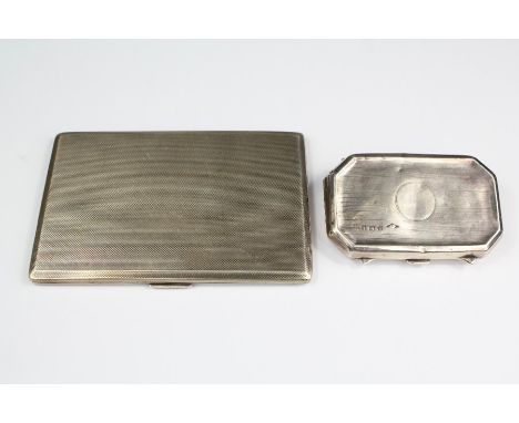 A Silver Cigarette Case, Birmingham hallmark, dated 1957, mm W.H.M engine-turned exterior and gilded interior, approx 8.5 x 1