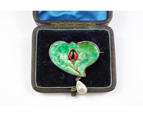 An Art Nouveau Silver Gilt Enamel and Mabe Pearl Thistle Brooch. The brooch set with red stone, approx 40 x 45 mm, approx 12.