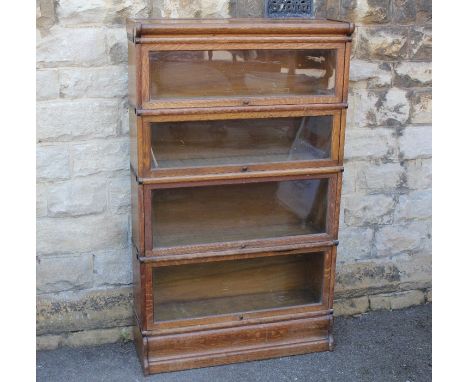 Vintage Globe Wernicke Bookcases. The first book case with four glaze-fronted compartments, approx 86 w x 145 h&nbsp; x 27 d 