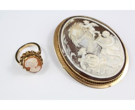 A Lady's 9ct Gold Shell Cameo Pendant Brooch, the cameo depicting a classical scene in a 9ct gold mount, Sheffield hallmark, 