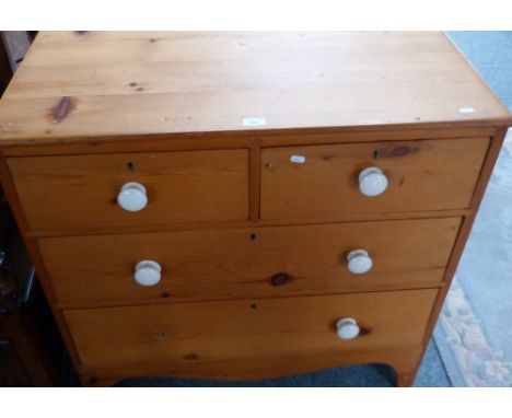 Stripped 19th century pine chest, of two short and two long graduated drawers, with ceramic knob handles, on bracket feet, 92