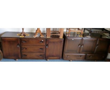 An Ercol dark stained elm sideboard of three drawers, flanked by two cupboard doors, 156cm wide together with the matching sm