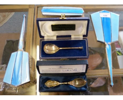 An Art Deco silver and two tone blue enamel dressing table set, Birmingham 1934, comprising hand mirror and two brushes, toge