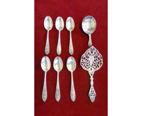 A set of six silver teaspoons Birmingham 1907 import marks, a cast decorative spoon Sheffield 1894 and a George III silver ca