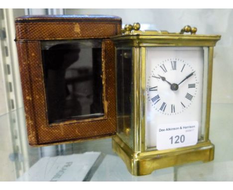 A brass cased carriage clock, with fitted case (af)