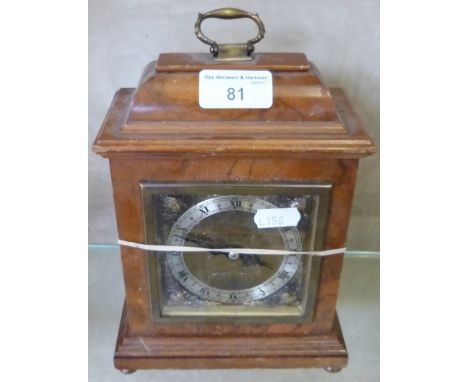 A burr walnut cased bracket style mantel clock by Elliott 