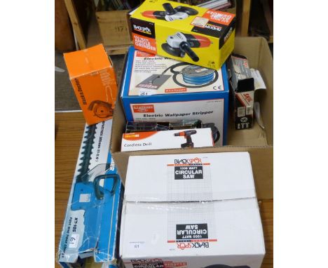 A Black Spur electric circular saw, boxed together with boxed electrical tools, cordless drill, wallpaper stripper, angle gri