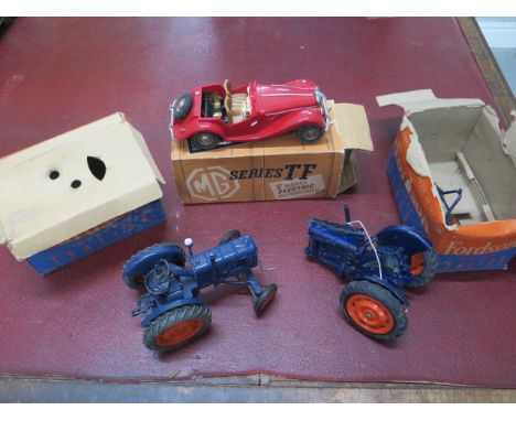 A Diecast Chad Valley Fordson Major Tractor with part box, another tractor with box spares or repairs and a V models plastic 