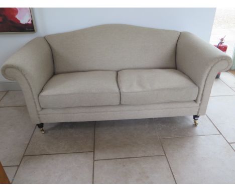 A Laura Ashley oatmeal 2 seater sofa, 192cm wide x 86cm tall x 93cm deep, in good condition 