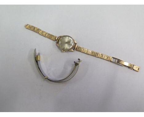 A hallmarked 9ct yellow gold Omega ladies manual wind wristwatch, not running, strap broken, with wear, total weight approx 1