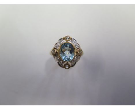 A 9ct hallmarked yellow gold, blue topaz, aquamarine and diamond ring, size K 1/2, approx 4 grams, in good condition 