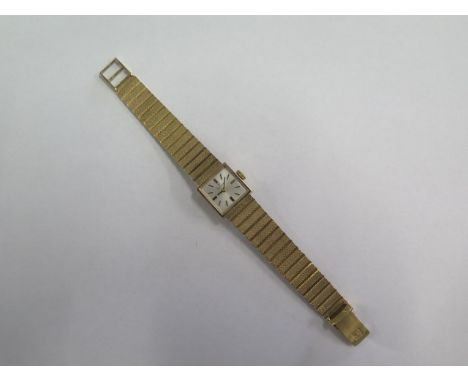 A hallmarked 9ct yellow gold Tissot ladies bracelet wristwatch, manual wind, running, generally good, total weight approx 26 