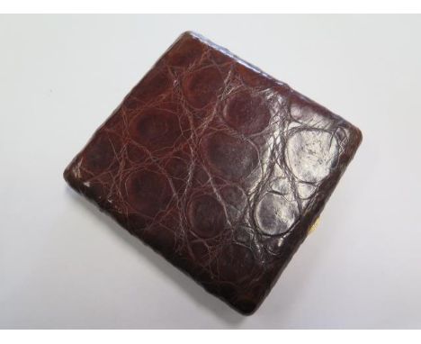 A vintage crocodile skin card case - 10cm x 10cm x 2cm - with a good colour and patina, clasp good 